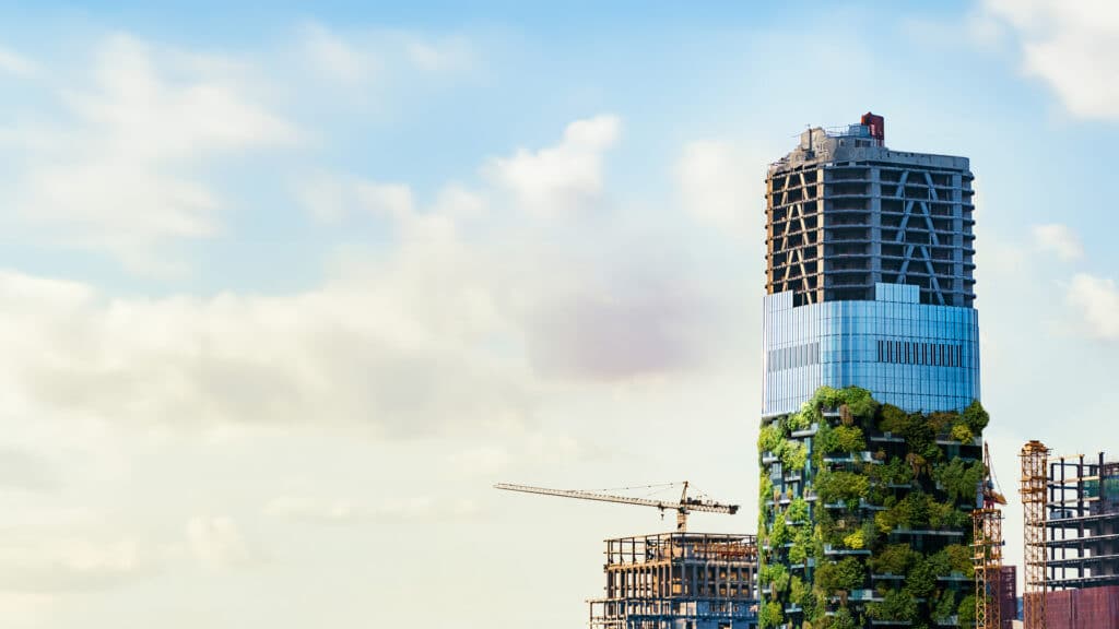 Skyscraper in construciton with green plants bottom-up as metaphor for the ESG Study 2024: Europe’s banks under the microscope